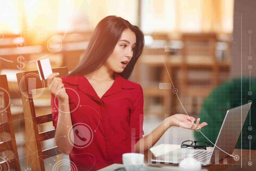 surprised-woman-with-card-hand-min surprised woman with card hand min