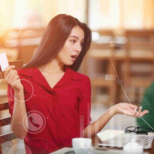 surprised woman with card hand min scaled