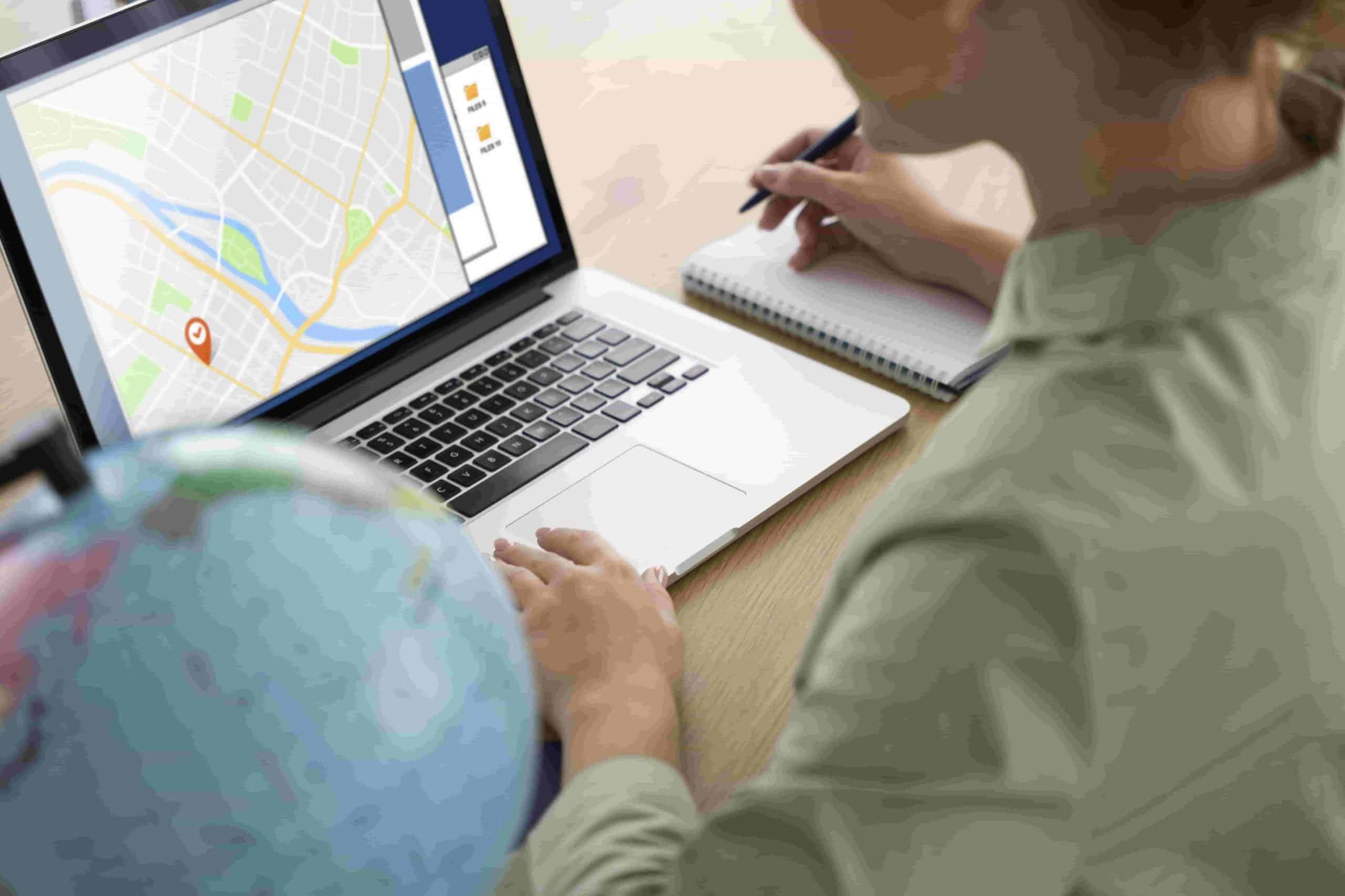 travel-agent-offering-trip-planning-clients-min travel agent offering trip planning clients min scaled